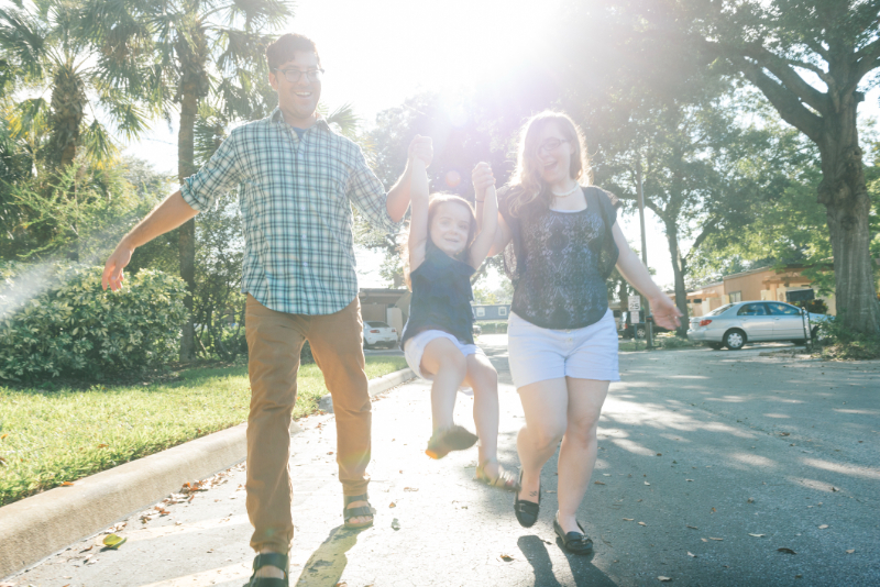 young Family Walking in Winter Park Neighborhood Orlando Florida